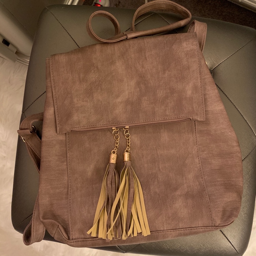Maybe backpack/ cross body bag.